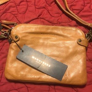 Wanderers travel co purse tan crossbody or wrist strap new